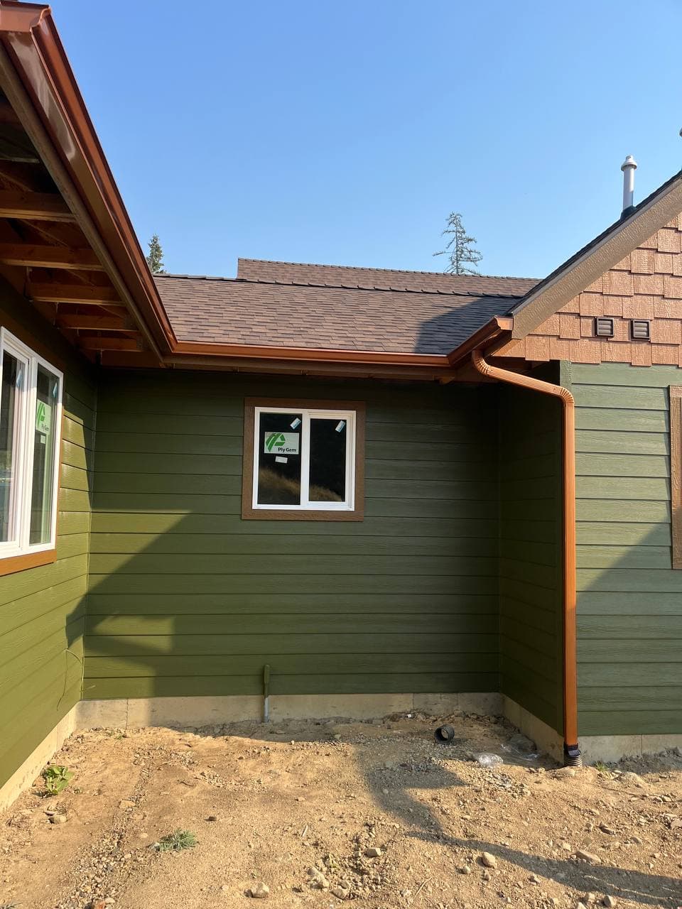 Finished seamless gutter installation on home exterior